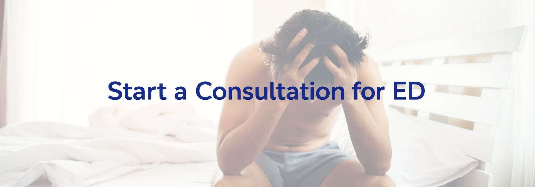 man sat on the edge of a bed